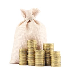 Photo of Bag and stacked coins isolated on white