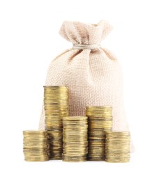 Photo of Bag and stacked coins isolated on white