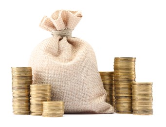 Photo of Bag and stacked coins isolated on white