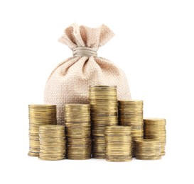 Photo of Bag and stacked coins isolated on white