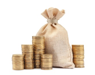 Photo of Bag and stacked coins isolated on white