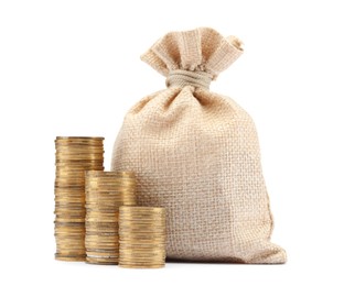Photo of Bag and stacked coins isolated on white