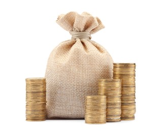 Photo of Bag and stacked coins isolated on white