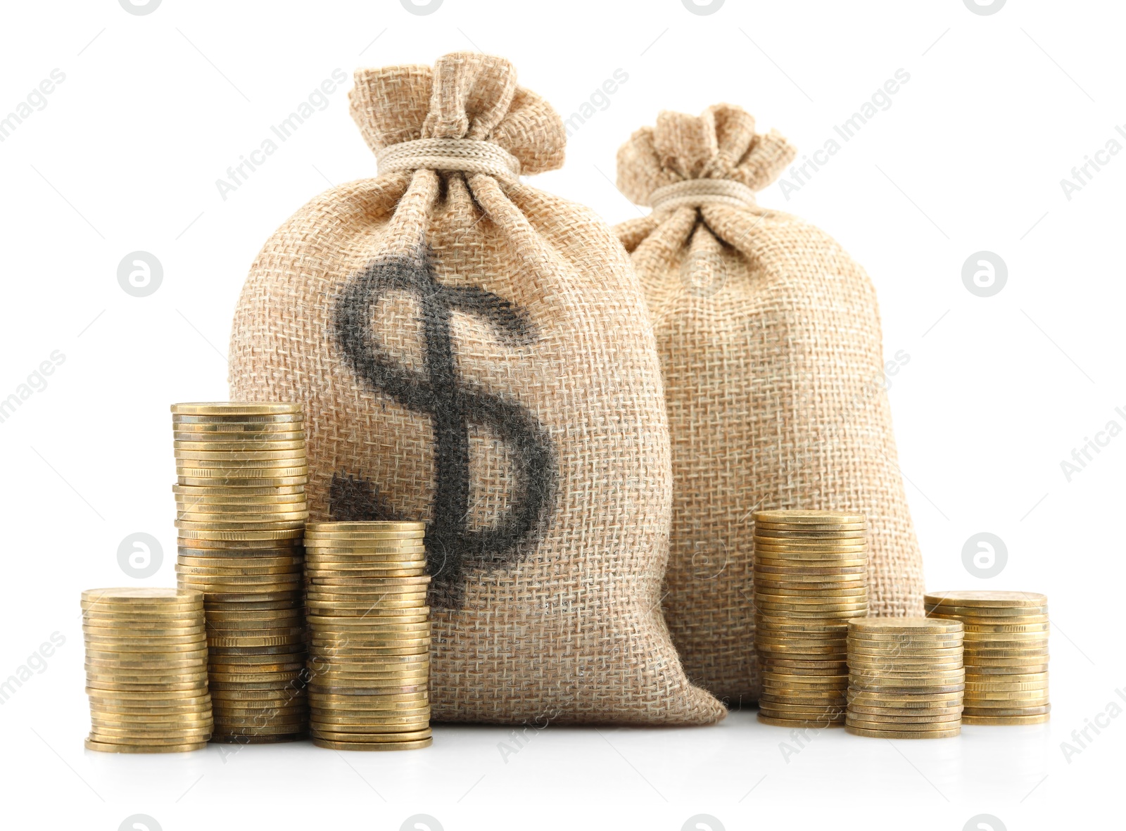 Bags with dollar sign and coins isolated on white Photo of Bags with dollar sign and coins isolated on white