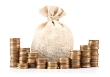Photo of Bag and stacked coins isolated on white