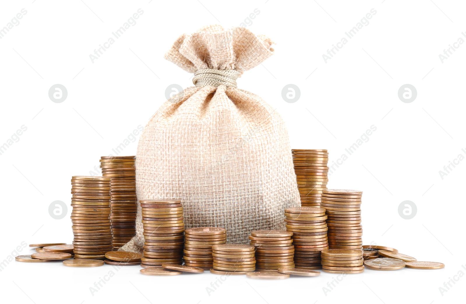 Bag and stacked coins isolated on white Photo of Bag and stacked coins isolated on white