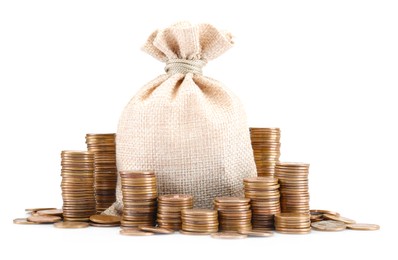 Photo of Bag and stacked coins isolated on white
