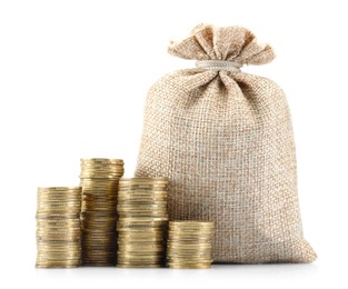 Photo of Bag and stacked coins isolated on white