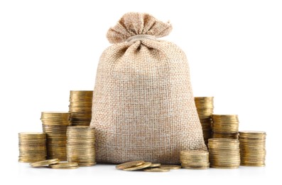 Photo of Bag and stacked coins isolated on white
