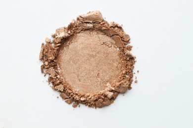 Photo of Sample of beautiful eyeshadow on white background, top view