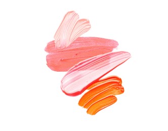 Photo of Samples of different lipsticks isolated on white, top view
