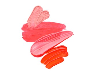 Photo of Samples of different lipsticks isolated on white, top view