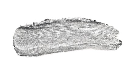 Photo of Sample of beautiful cream eyeshadow isolated on white, top view
