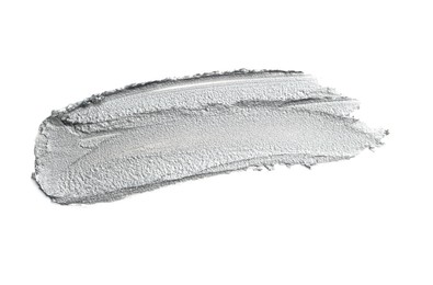 Photo of Sample of beautiful cream eyeshadow isolated on white, top view