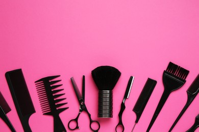 Photo of Different hairdresser's tools on pink background, flat lay. Space for text