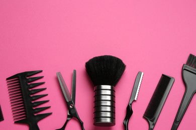 Photo of Different hairdresser's tools on pink background, flat lay. Space for text