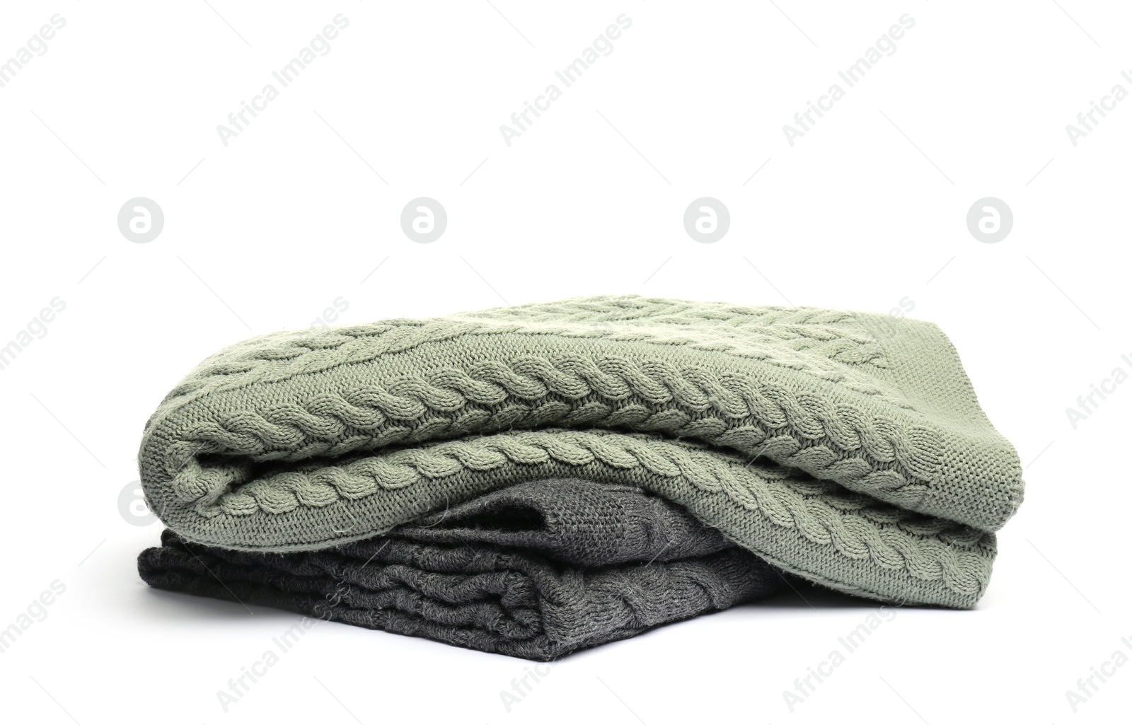 Two folded woolen blankets isolated on white Photo of Two folded woolen blankets isolated on white