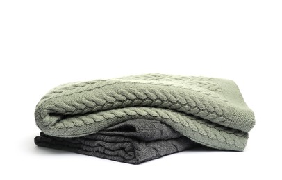 Photo of Two folded woolen blankets isolated on white