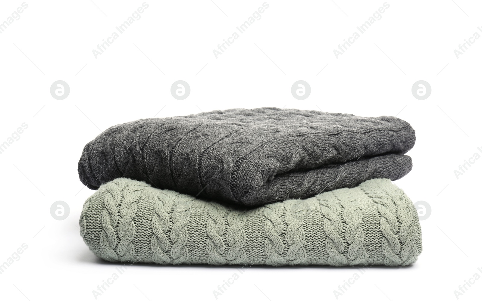 Two folded woolen blankets isolated on white Photo of Two folded woolen blankets isolated on white