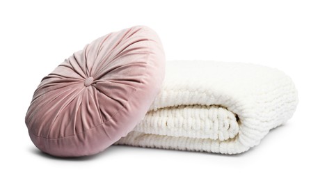 Photo of Folded woolen blanket and pillow isolated on white