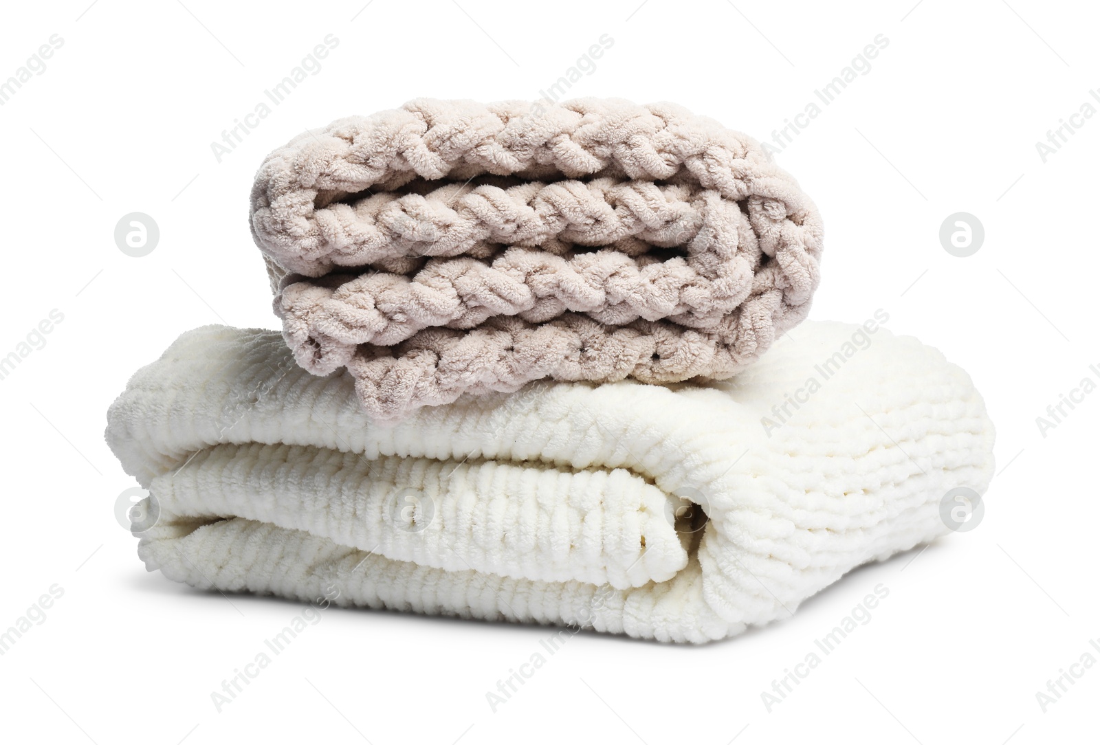 Two folded woolen blankets isolated on white Photo of Two folded woolen blankets isolated on white