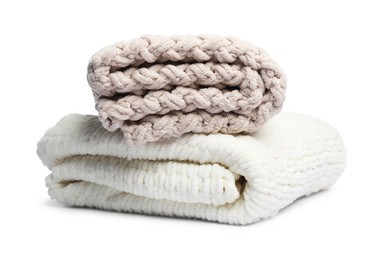 Photo of Two folded woolen blankets isolated on white