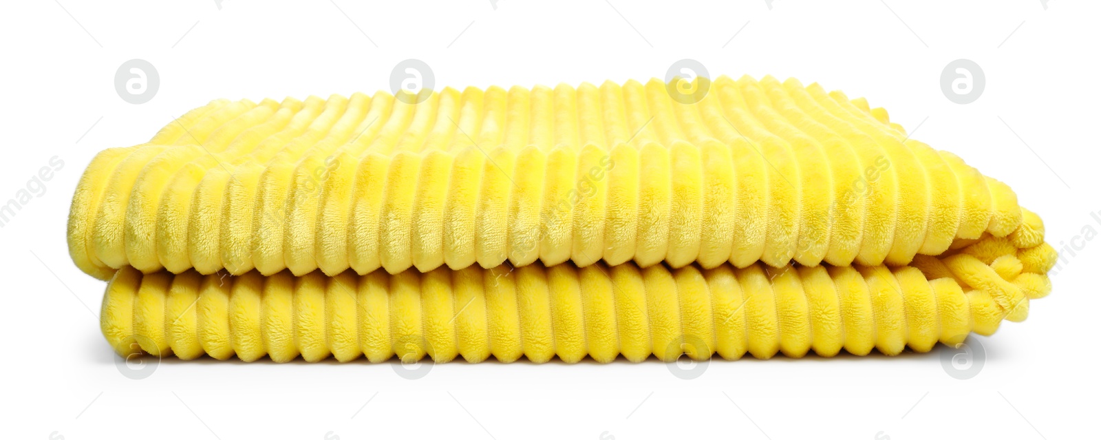 Photo of Folded yellow woolen blanket isolated on white