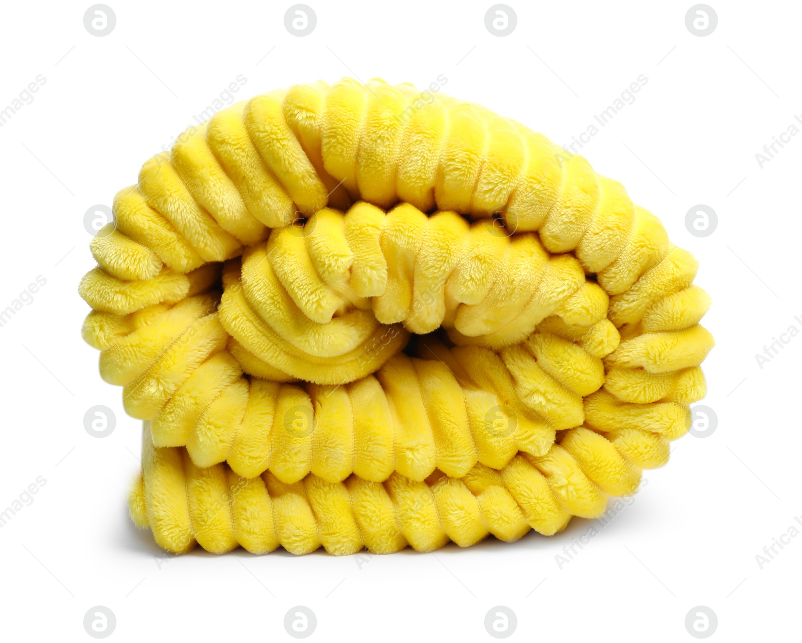 Folded yellow woolen blanket isolated on white Photo of Folded yellow woolen blanket isolated on white