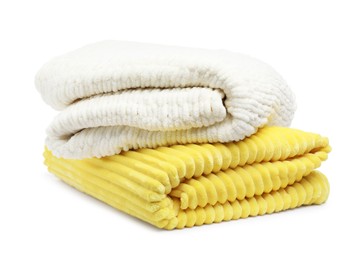 Photo of Two folded woolen blankets isolated on white