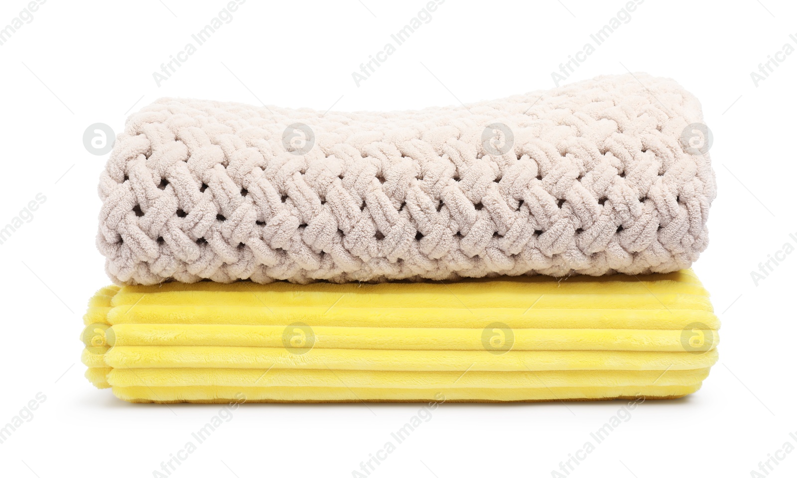 Two folded woolen blankets isolated on white Photo of Two folded woolen blankets isolated on white