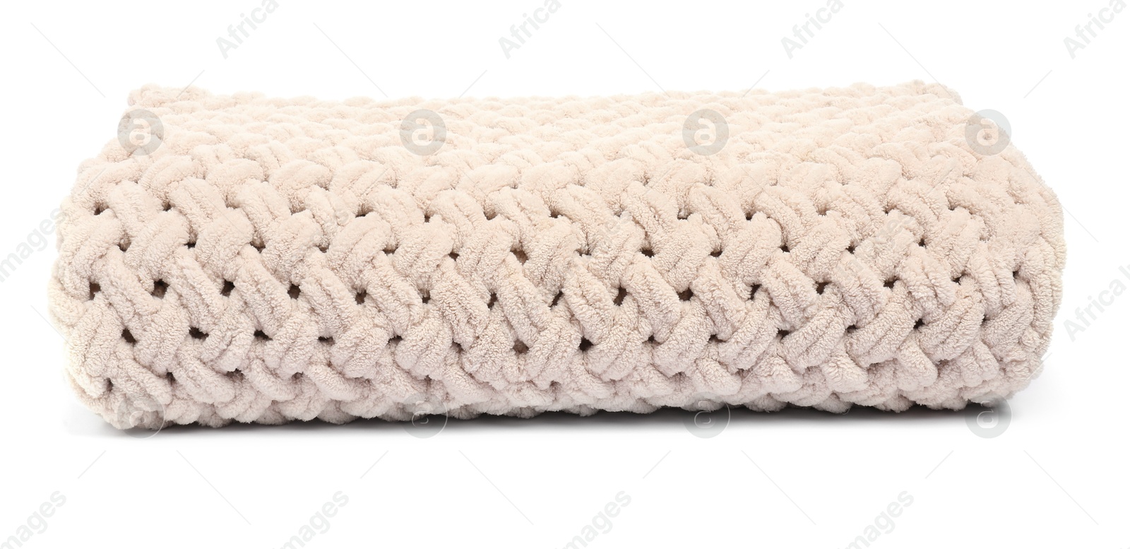 Folded beige woolen blanket isolated on white Photo of Folded beige woolen blanket isolated on white
