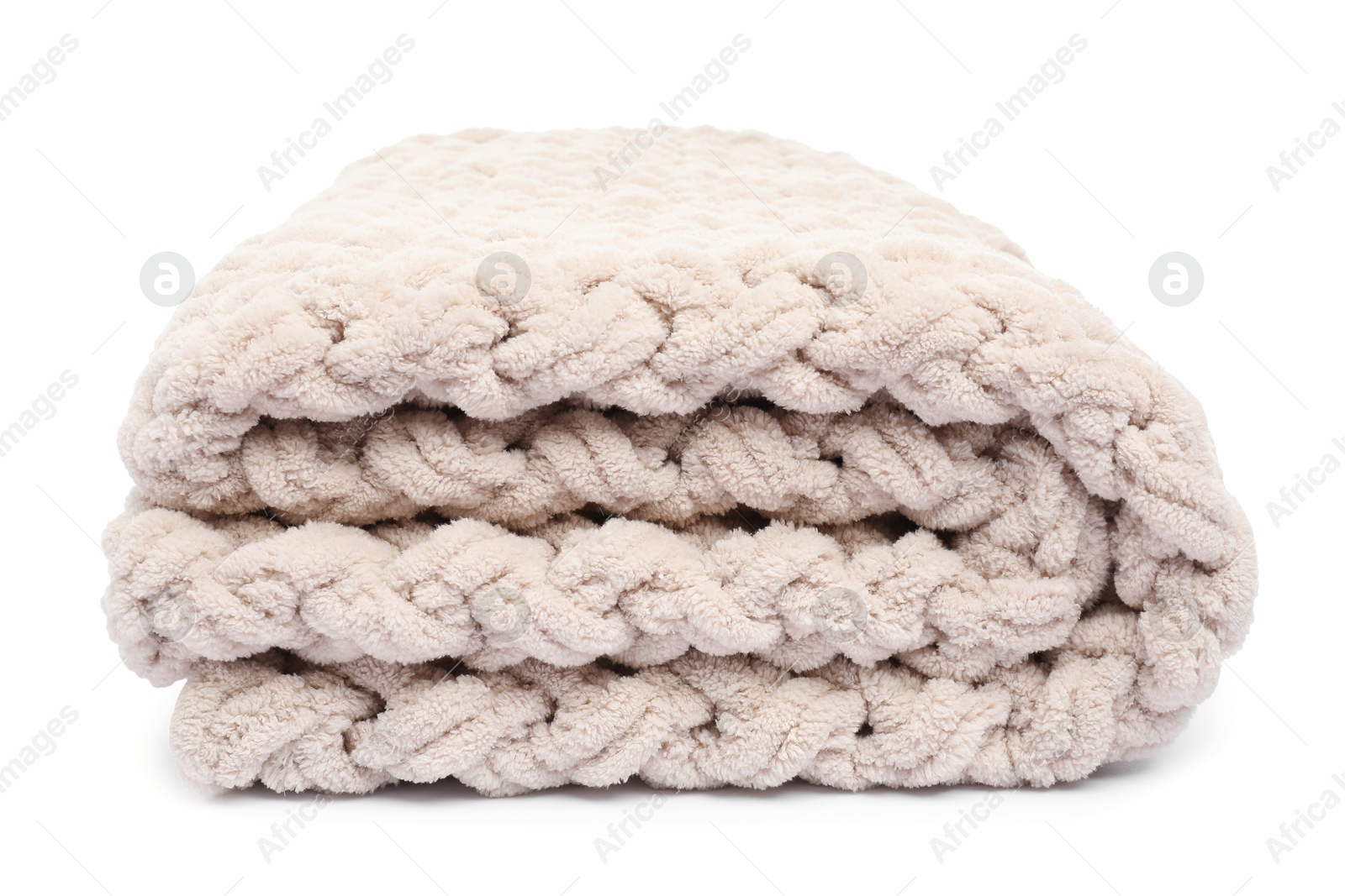 Folded beige woolen blanket isolated on white Photo of Folded beige woolen blanket isolated on white