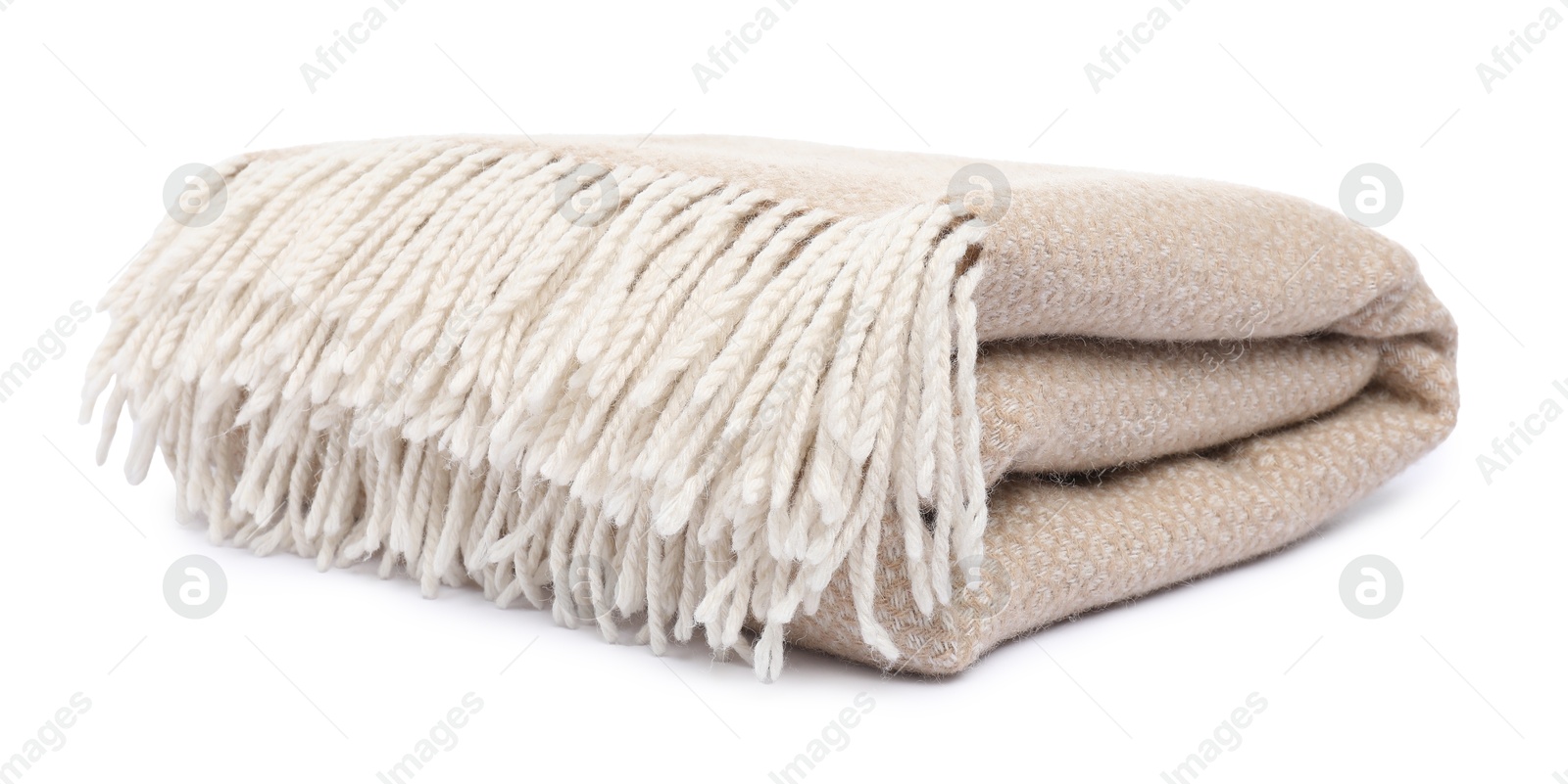 Folded beige woolen blanket isolated on white Photo of Folded beige woolen blanket isolated on white