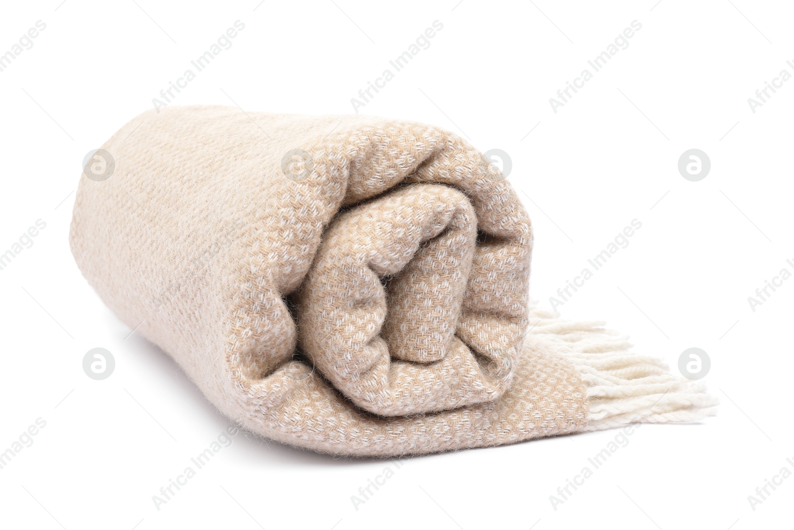 Folded beige woolen blanket isolated on white Photo of Folded beige woolen blanket isolated on white