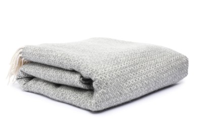 Photo of Folded grey woolen blanket isolated on white