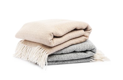 Photo of Two folded woolen blankets isolated on white