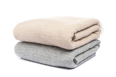 Photo of Two folded woolen blankets isolated on white