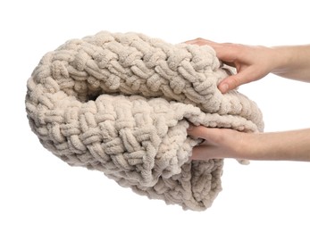 Photo of Woman with folded beige blanket on white background, closeup