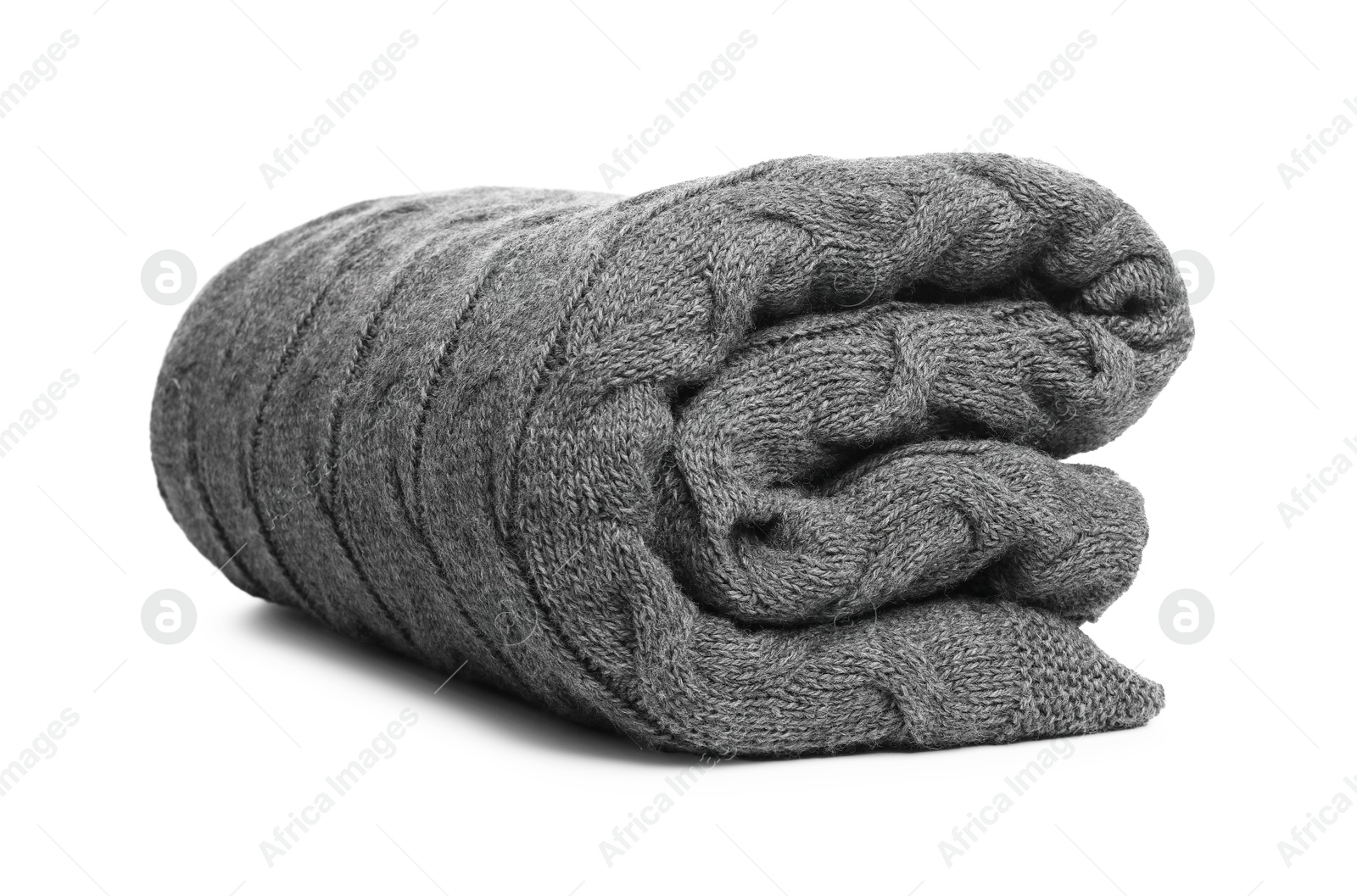 Folded grey woolen blanket isolated on white Photo of Folded grey woolen blanket isolated on white