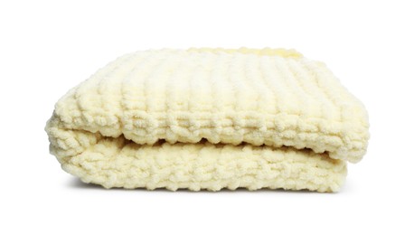 Photo of Folded pale yellow woolen blanket isolated on white