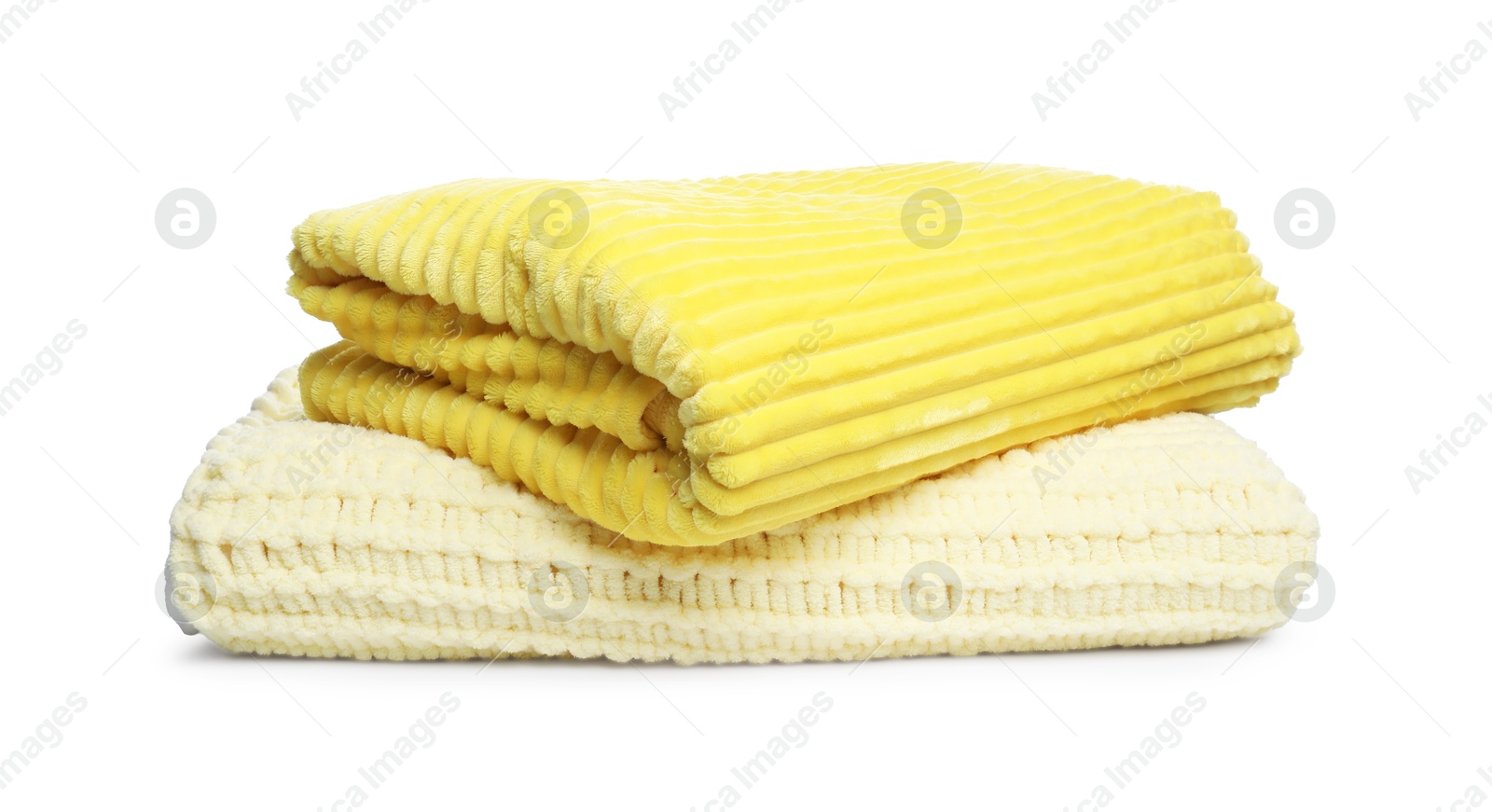 Two folded woolen blankets isolated on white Photo of Two folded woolen blankets isolated on white