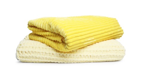 Photo of Two folded woolen blankets isolated on white