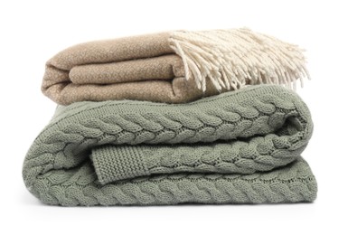 Photo of Two folded woolen blankets isolated on white