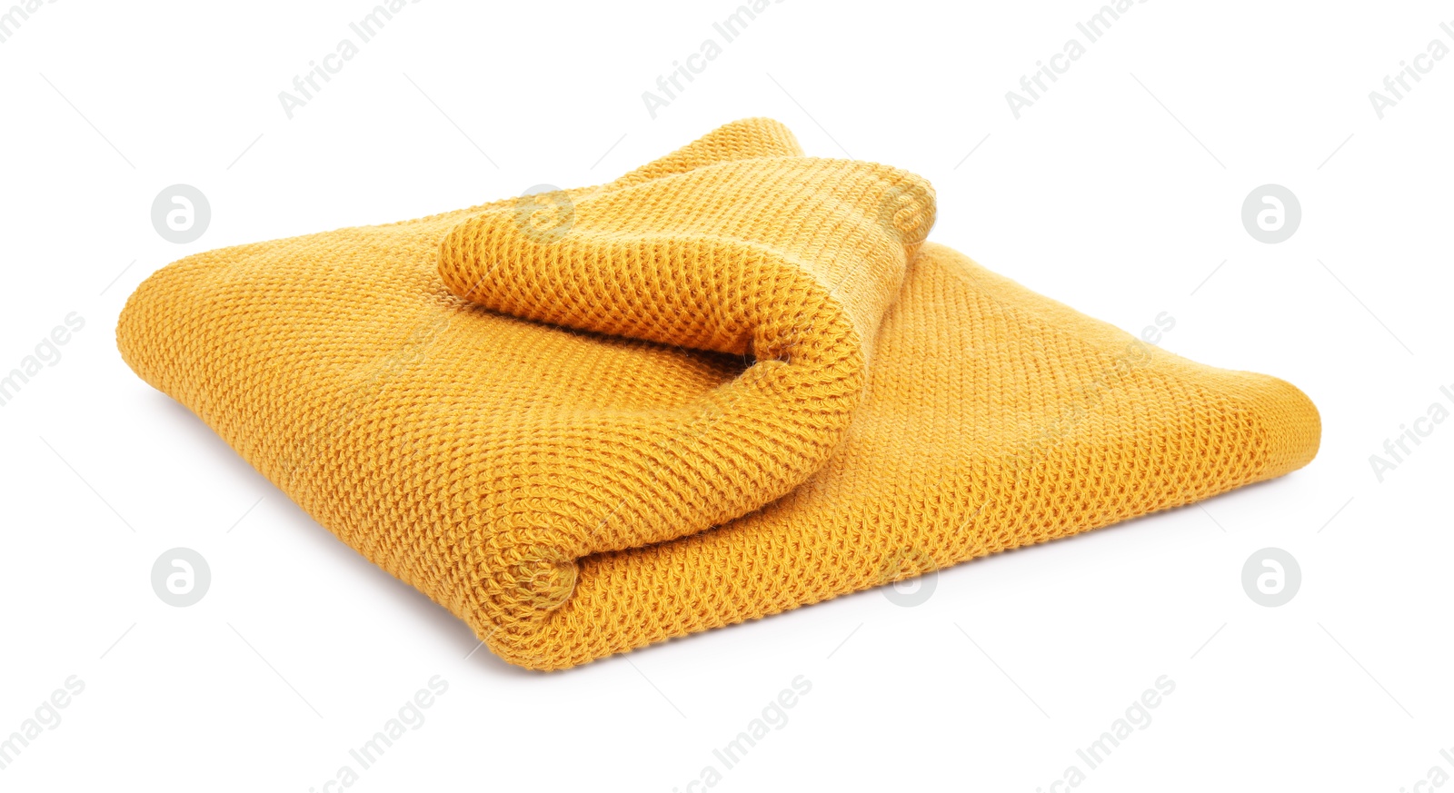 Folded orange woolen blanket isolated on white Photo of Folded orange woolen blanket isolated on white