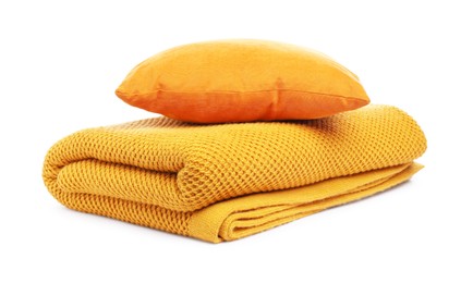 Photo of Folded woolen blanket and pillow isolated on white