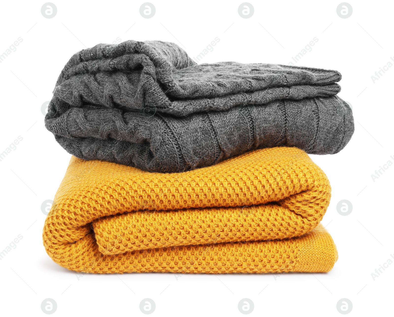Two folded woolen blankets isolated on white Photo of Two folded woolen blankets isolated on white