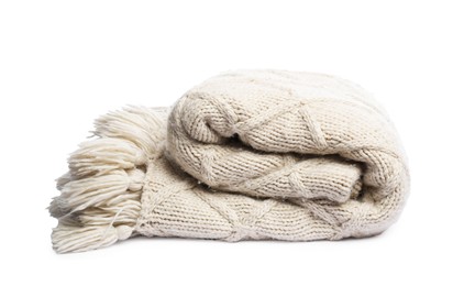 Photo of Folded beige woolen blanket isolated on white