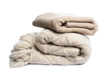 Photo of Two folded woolen blankets isolated on white