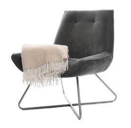 Photo of Comfortable armchair with blanket isolated on white