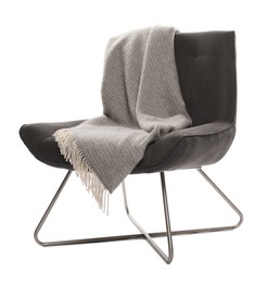 Photo of Comfortable armchair with blanket isolated on white